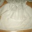 suknia biała wzory guziki falbanka
