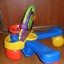 FISHER PRICE PLAY ZONE CHODZIK JEŹDZIK PCHACZ