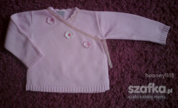 Różowy kopertowy sweterek