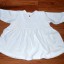 biała sukienka 68