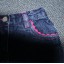 krotkie jeansy z rozowa lamowka