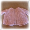 rózowy sweterek