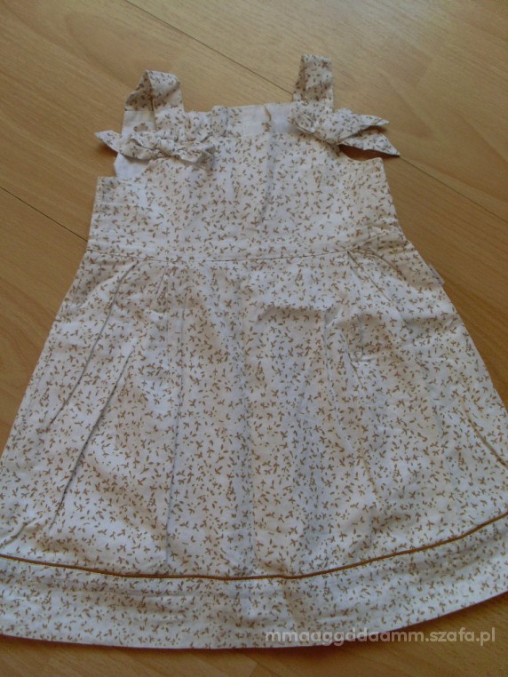 Urocza sukienka 74cm