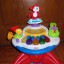 Fisher Price muzyczny stoliczek tańczaca małpka