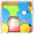 Muzyczny słonik Fisher Price z 4 klockami