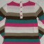 Modna tunika w kolorowe paski r 104 110 Promocja