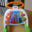 Fisher Price GRAJACY MUZYCZNY CHODZIK PCHACZ