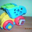 AUTO WYWROTKA FISHER PRICE Z KLOCKAMI SENSORYCZNYM