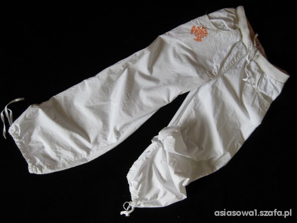 Śliczne białe spodnie RESERVED 140