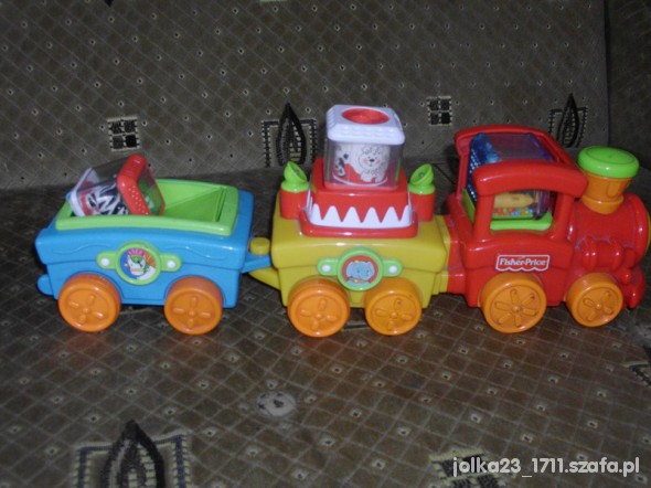 jezdzaca i grajaca ciuchcia fisher price z klockam