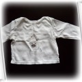 biała bluzeczka kaftanik niemowlęcy