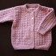 różowy ciepły sweterek 74