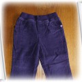 CHEROKEE fioletowe sztruksowe spodnie rozm 92