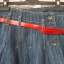 Jeansowa spódnica z aplikacjami i paskiem