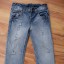 Spodnie jeansowe z dziurami roz 110cm NEXT
