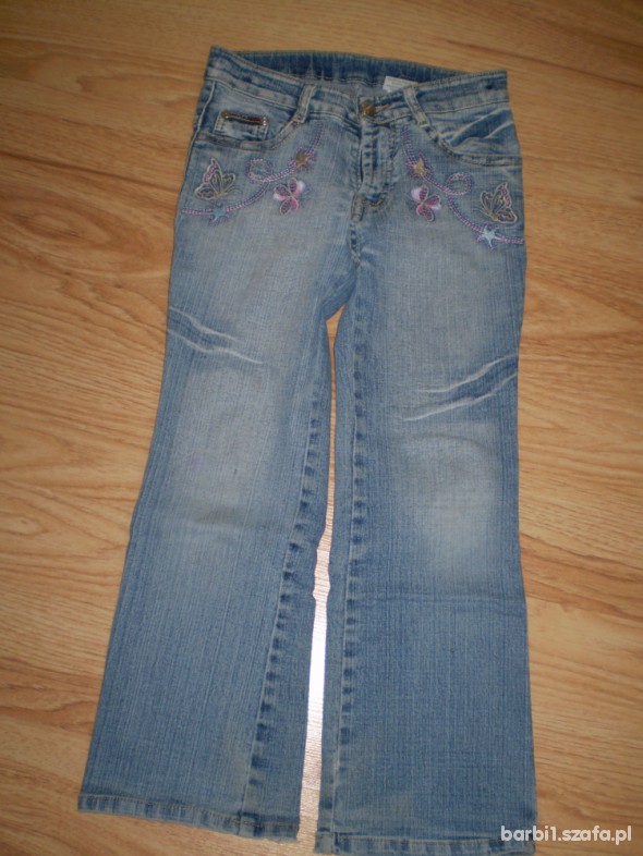 Spodnie jeans przecierane122