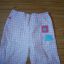 śliczne spodnie dla dziewczynki różowe w kratkę 6m