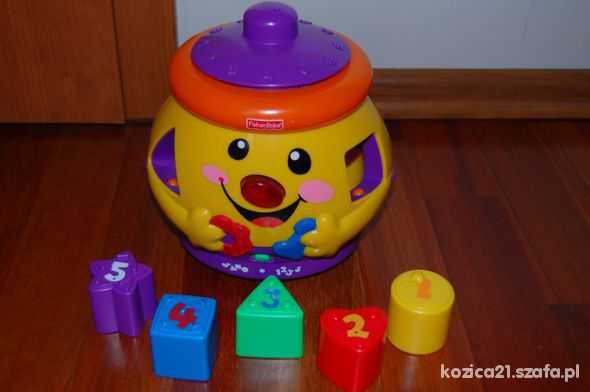 Garnuszek na klocuszek Fisher Price