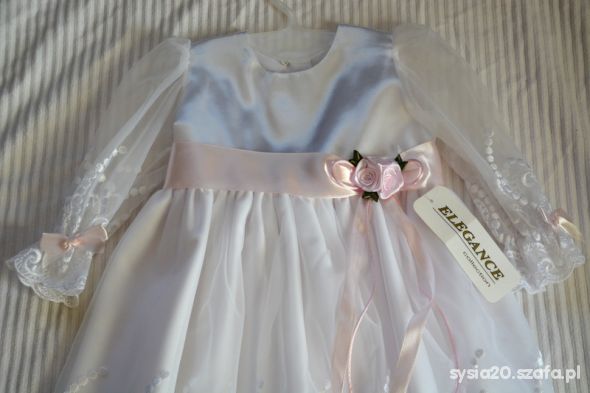 Piekna haftowana bial sukienka