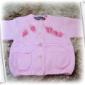 Różowy cieplutki sweterek dla dziewczynki wełniany