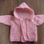Różowy sweterek ażurkowy 68