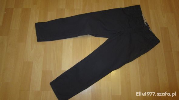 Eleganckie spodnie Reserved rozm 134