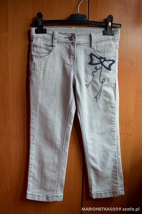 Spodnie jeansy z kokardkami koralikami TU