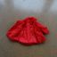 Czerwony płaszczyk 74 cm kokardki