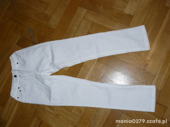 Białe spodnie jeansowe 146 152