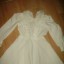 urocza biala sukienka z żabotami falbanka