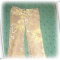 śliczne spodnie motyw lisci na materiale 116