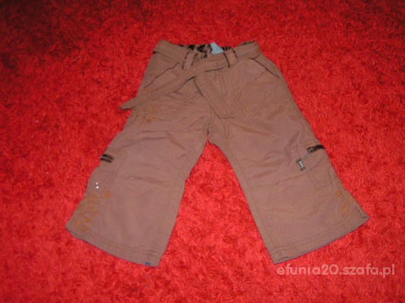 Brązowe spodnie z aplikacjami na 84 cm