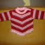 Asymetryczny dziewczęcy sweterek z frędzlami 74