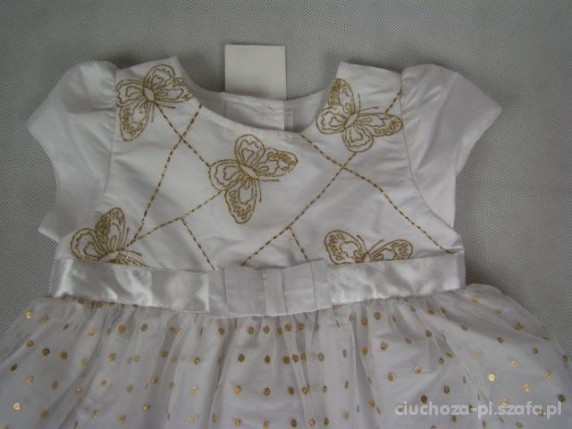 Biała sukienka ze złotymi dodatkami