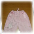 Różowe spodnie z haftowanym kwiatkiem r 68