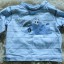 Błękitna bluzeczka z nadrukiem 68 cm