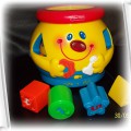 Garnuszek na klocuszek j ang fisher price