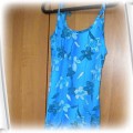 Piękna niebieska sukienka 146