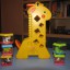 Żyrafa Fisher Price oraz klocki sensoryczne
