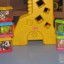 Żyrafa Fisher Price oraz klocki sensoryczne