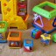 FISHER PRICE piramidka plus muzyczny sorter