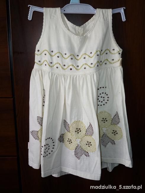 Kremowa sukienka dla dziewczynki 12 mcy
