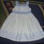 Biała sukieneczka z niebieskim haftem roz 74 80