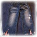 Spodnie jeansowe z naszywkami 110 4 5lat