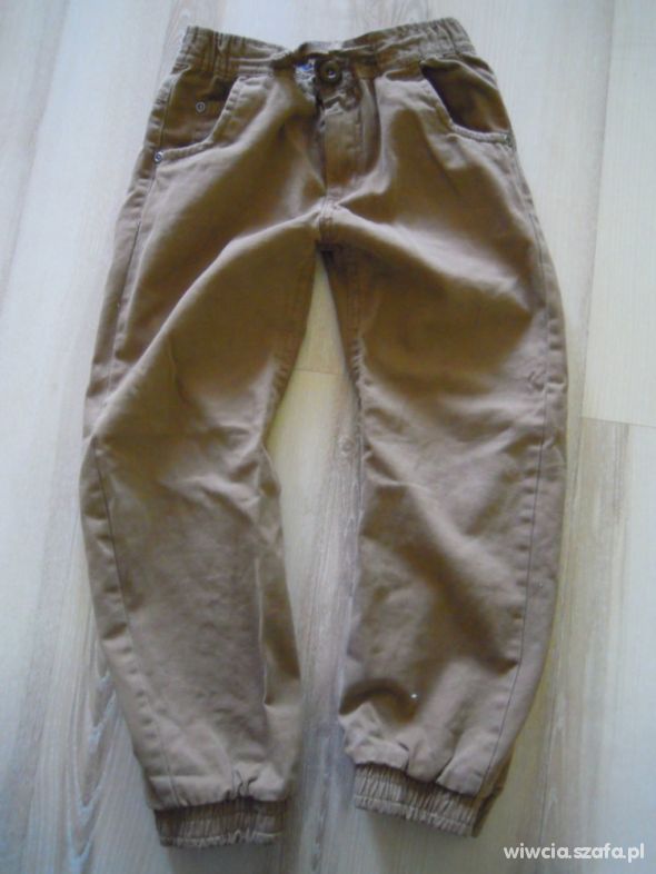 Brazowe chinosy r 116