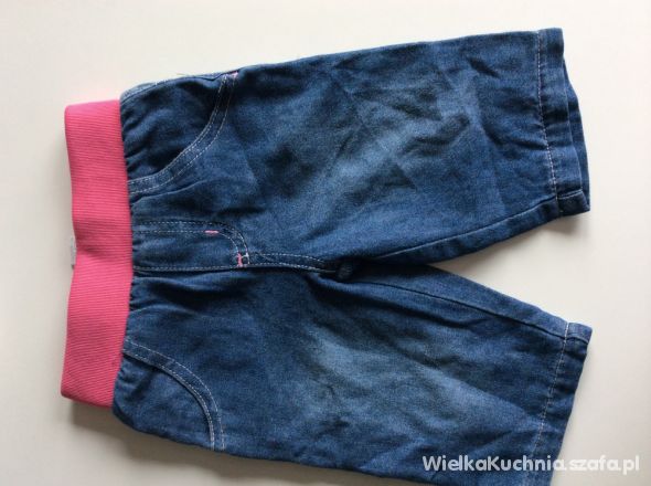 Spodnie jeansowe na różowym ściągaczu