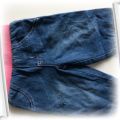 Spodnie jeansowe na różowym ściągaczu