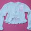 nowy śliczny biały sweterek bolerko falbanki 146