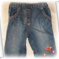 Spodnie jeansowe z kwiatkami 68cm