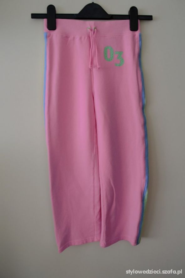 Różowe spodnie kolorowe paski 6 l 116 cm
